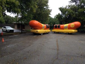 Oscar Meyer hotdog marketing vehicles parked behind the inn.